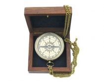 Compass with anchor engraved in wooden box